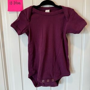 Kate Quinn ribbed cotton onesie bodysuit